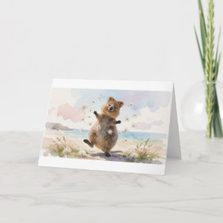 Cartão Quokka Dançando Com Flocos de Sementes Flutuantes