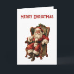 Cartão Retro Papai Noel Sentado em Cadeira de Natal<br><div class="desc">Cartão de Natal com uma imagem de estilo vintage com o Pai Natal clássico sentado numa cadeira de braço antiquada. Adorável design de Natal tradicional.</div>