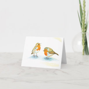 Cartão Robins vermelhos no inverno