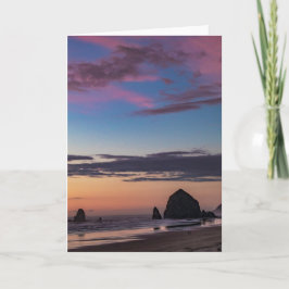 Cartão Rocha do monte de feno - por do sol no crepúsculo