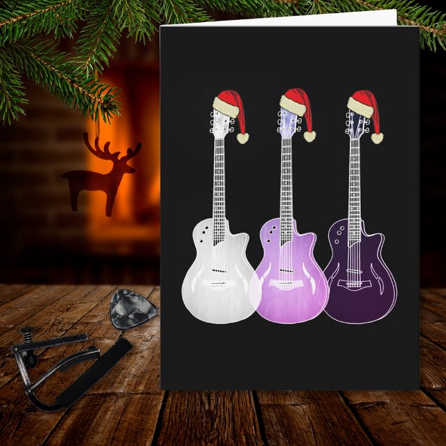 Cartão Rosa de guitarra elétrica de Natal (Christmas guitars wearing santa hats pink black and white music themed holiday greetings card)