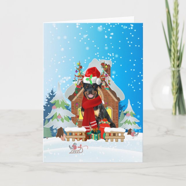 Cartão Rottweiler na neve com presentes de Natal  (Frente)
