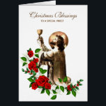 Cartão Santo Padre Jesus Clergia Santa Missa<br><div class="desc">Esta é uma bela imagem católica tradicional Jesus Cristo o Grande Padre oferecendo seu sangue no Santo Chalice cercado por rosas vermelhas e Holly. Todo texto e fontes podem ser modificados.</div>