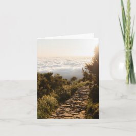 Cartão Serene path above the clouds with golden sunrise