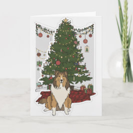 Cartão Sheltie junto à árvore de Natal