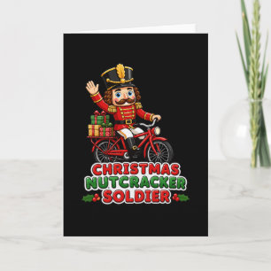 Cartão Soldado quebra-nozes de Natal andando de bicicleta