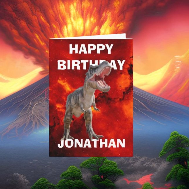 Cartão Tornar seu aniversário inesquecível com nosso T-Re (Unleash your creativity with our T Rex dinosaur card featuring a striking red volcano!)