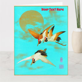 Cartão Três guindastes sarus voando em frente à lua