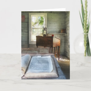 Cartão Uma sala de aula com livro