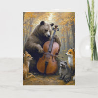 Urso de aniversário tocando violoncelo em bosques