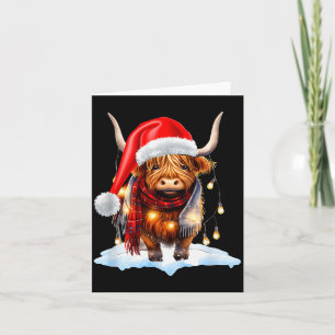 Cartão Vaca das Terras Altas da Escócia de Natal Envolta
