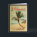 Cartão Viagens vintage da palmeira de Hollywood<br><div class="desc">Um impressão moderno da arte de Hollywood Florida do meio século excepcionalmente retro no estilo do poster das viagens vintage. Caracteriza uma palmeira curvada no Sandy Beach com oceano sob um céu nebuloso azul.</div>