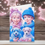 Cartão Vintage Children and Puppies Christmas<br><div class="desc">Cartão de Natal bonito. Duas crianças bonitinhas,  um menino e uma menina,  irmão e irmã segurando cachorros em chapéus de inverno azul e rosa.</div>
