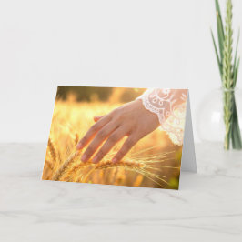 Cartão Woman's Hand Touching Wheat Tassels