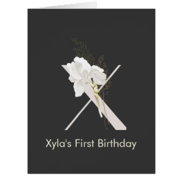 Cartão X inicial com flor de cor suave em preto