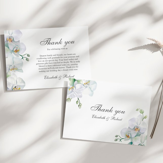 Cartões de agradecimentos De Casamento Da Orquídea (Elegant White Orchid Wedding Thank You Card on a sunny elegant white table.)