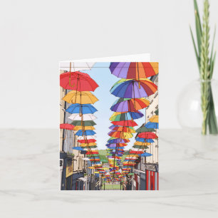 Cartões de saudação vista de guarda-chuvas colorid