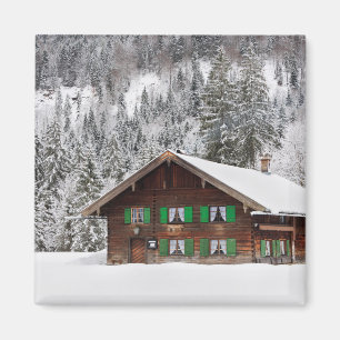 Casa tradicional de madeira em íman da Baviera