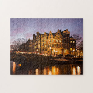 Casas do canal de Amsterdão no quebra-cabeça de