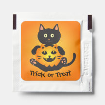 Cat Holding Jack-o-Lanterna