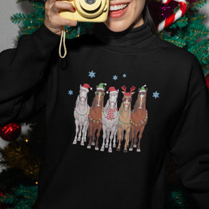 Cavalos de na moda vestidos no Natal