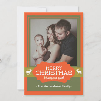 Cervos do Feliz Natal que caçam o cartão de Natal