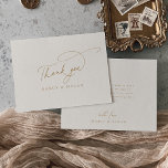 Charm Flat Ivory Wedding Elegante Obrigado Cartões<br><div class="desc">Este elegante casamento de marfim chato, obrigado... As cartas são perfeitas para um casamento mínimo. O moderno design minimalista apresenta creme de vintage eterno e caligrafia romântica dourada com estilo de conto de fadas boêmia. Personalize a parte de trás dos seus agradecimentos, anotando seus nomes, e um obrigado que você...</div>