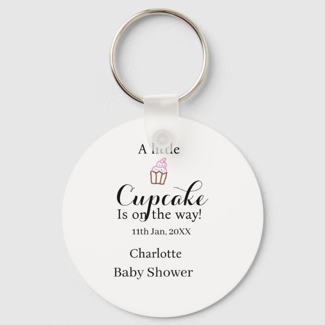 Chaveiro A little cupcake is on its way baby shower name da (Frente)