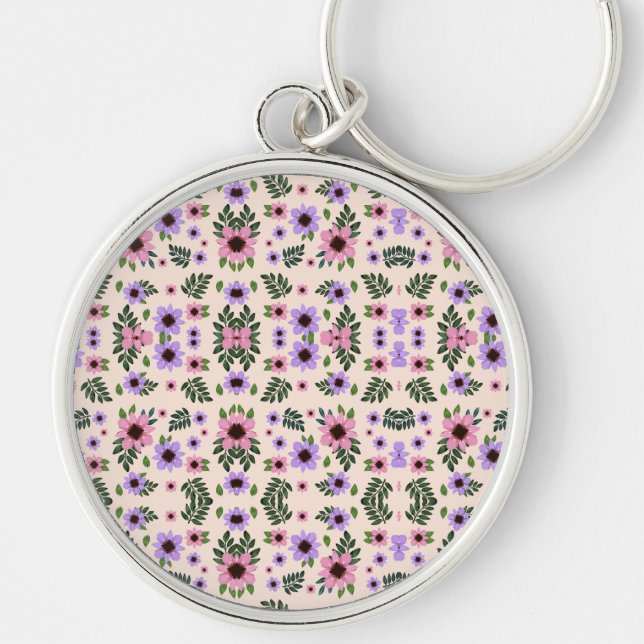Chaveiro A round keychain featuring a vibrant floral  (Frente)