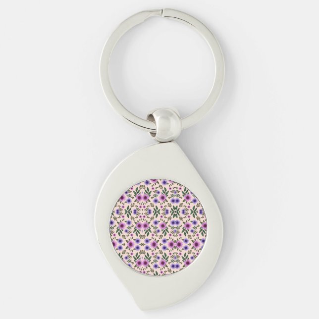 Chaveiro A stylish keychain featuring a round, colorful  (Frente)