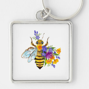 Chaveiro Abeja flor com plantas silvestres