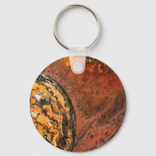 Chaveiro Abstrato planeta em vermelho e laranja