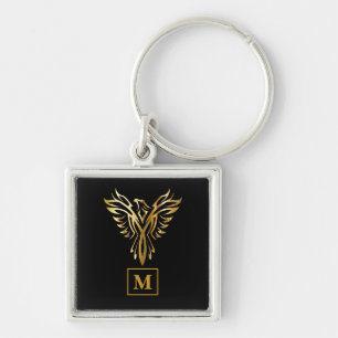 Chaveiro Acessório Phoenix Rising Preto e Dourado Monogram
