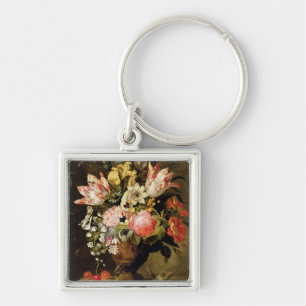 Chaveiro Ainda vida das flores em um vaso com um lagarto em