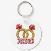 Aleitados anéis de casamento entrelaçados com rosa