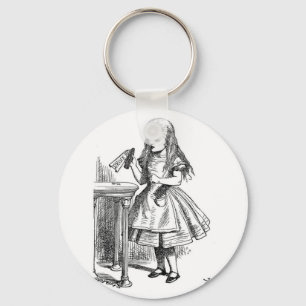 Chaveiro Alice com "bebida mim" garrafa