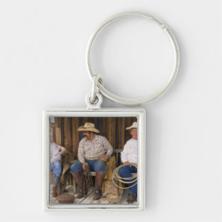 Chaveiro América do Norte, EUA. Cowboys relaxando e