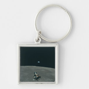 Chaveiro Apollo Lunar Lander e Earthrise sobre Lua