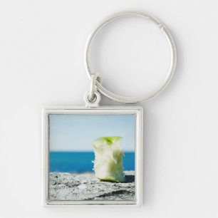 Chaveiro Apple retira o núcleo na sujeira