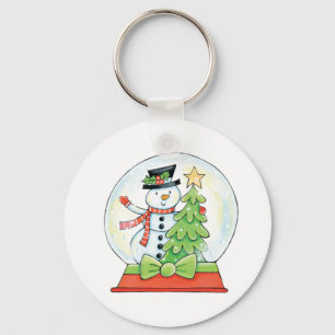 Chaveiro Árvore do boneco de neve e de Natal em um globo d