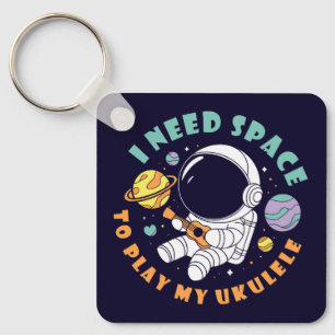 Chaveiro Astronauta Kawaii tocando Ukulele no Espaço