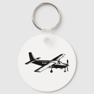 Chaveiro avião a hélice voo de avião