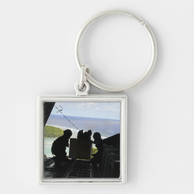 Chaveiro Aviões empurram uma palete de mercadorias doadas (Frente)