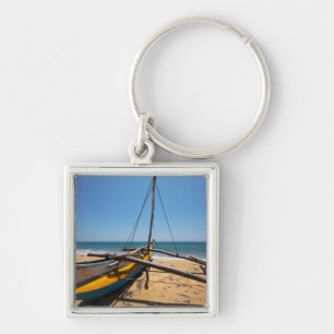 Chaveiro Barco de pesca amarrado na praia