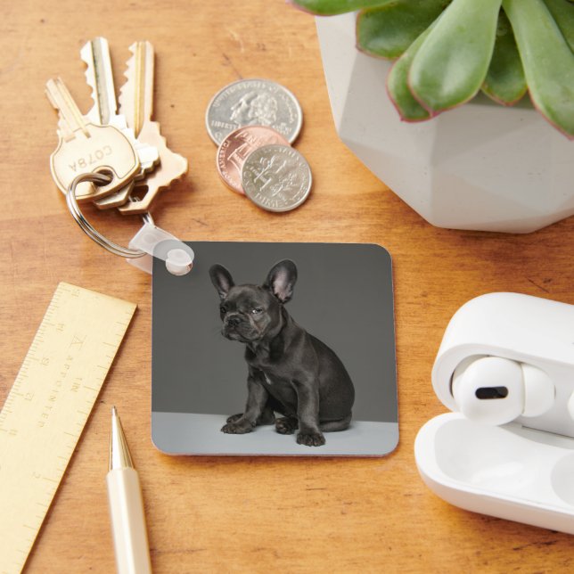 Chaveiro Bebês Mais Pobres | Bolha Azul Frente (Mesa)