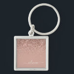 Chaveiro Blush Rosa Dourado Rosa Brilho Monograma Script Fe<br><div class="desc">Pingente de Nome Monograma em Glitter com Brilho Rosa Bege - Dourado Rosado (Corrente de Chaves). Isso torna o presente perfeito para aniversário de 16 anos, casamento, chá de noiva, aniversário de casamento, chá de bebê ou festa de despedida de solteira para alguém que ama luxo e estilos elegantes e...</div>