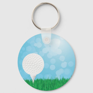 Chaveiro bola de golfe na grama