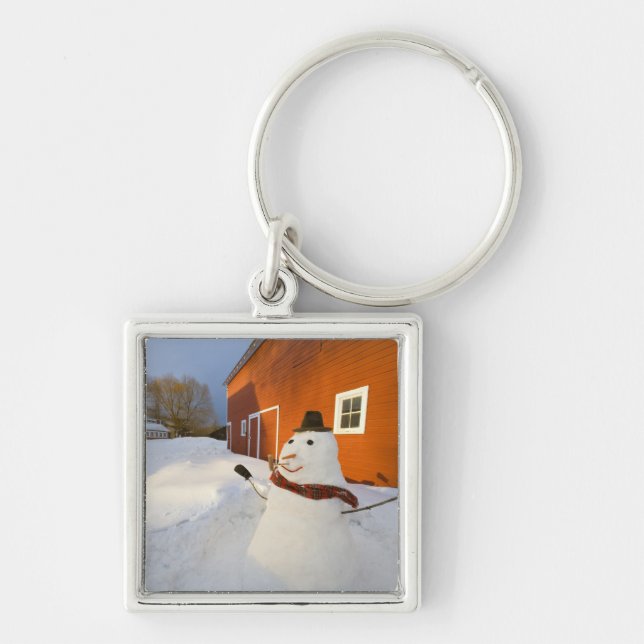 Chaveiro Boneco de neve em frente ao celeiro vermelho em Co (Frente)