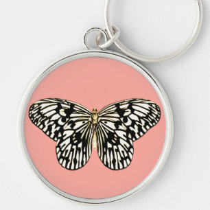 Chaveiro Borboleta branca e preta,fundo rosa-coral