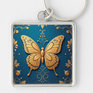 Chaveiro Borboleta Dourada Ornamentada Com Padrão Floral